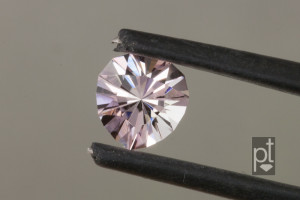 Pink Tourmaline Heart in tweezers