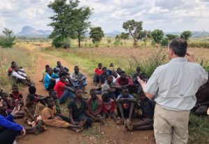 Roger Dery teaching in field