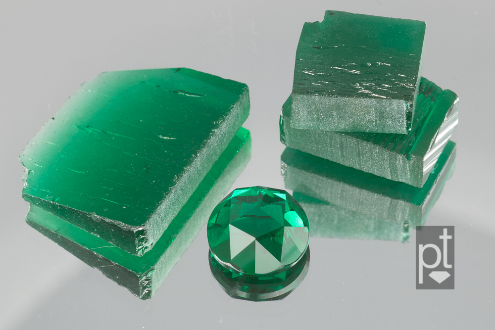 hydrothermal emerald rough and rose cut