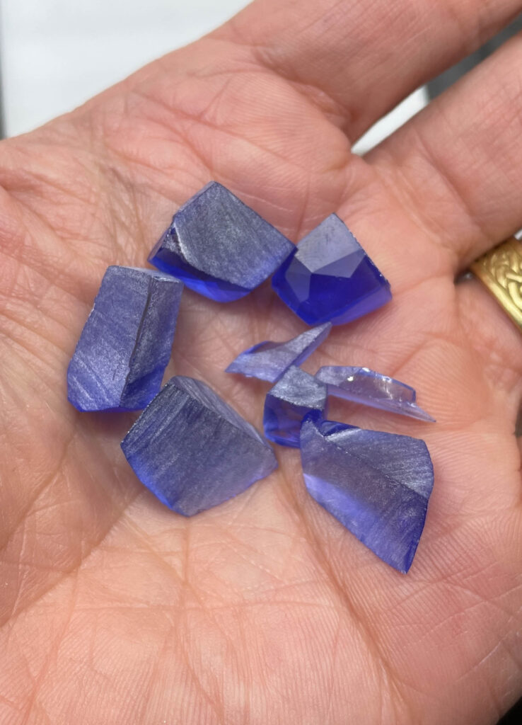 recovered clean tanzanite in hand