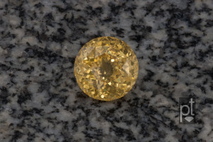 Yellow Sapphire Round with background